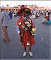 Porteur d'eau traditionnel sur la place Jemaa-el-fna, Marrakech, Maroc