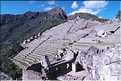 100 A gauche ont peut voir le quartier des agriculteurs et en haut le mirador, Machu Picchu