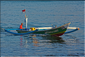 2 ..., au moment oú les pêcheurs rentrent avec leurs prises (Jimbaran). (9)