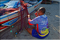 4 ..., pendant que les pêcheurs préparent les filets pour la prochaine sortie.   (Jimbaran). (10)