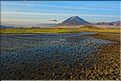 Le volcan Ol Doinyo Lengai -qui veut dire la montagne de dieu en maasa- vu des berges du lac Natron. (1)